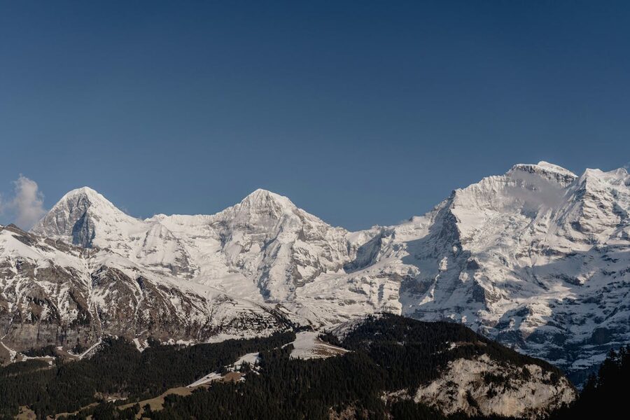 Lauterbrunnen valley with snow-covered Swiss Alps cliffs