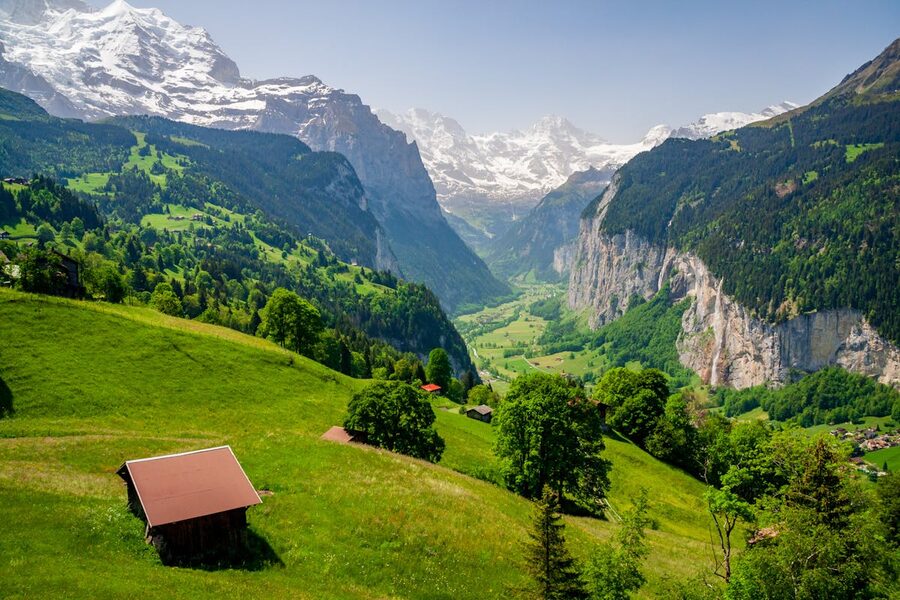 Lauterbrunnen Valley with waterfalls and green meadows in the Bernese Oberland Switzerland