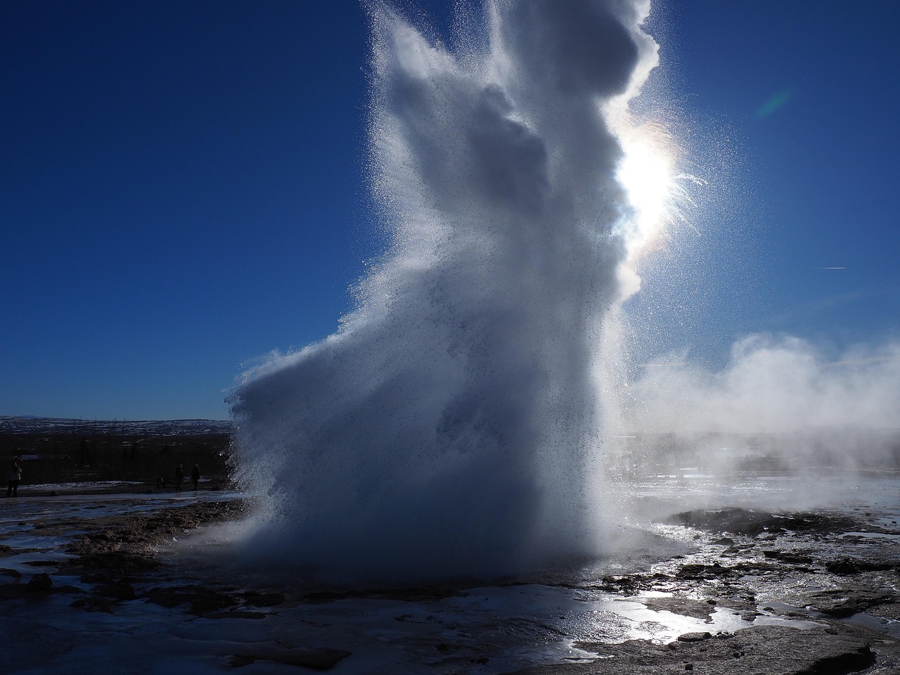 Strokkur geyser erupting in Iceland geothermal area