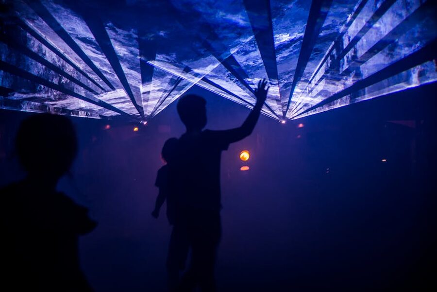 Silhouette of a visitor at a light installation