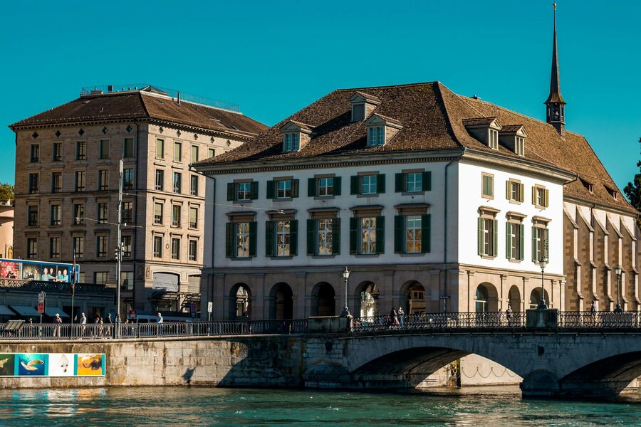 Scenic view of Zurich's historic waterfront and architectural landmarks
