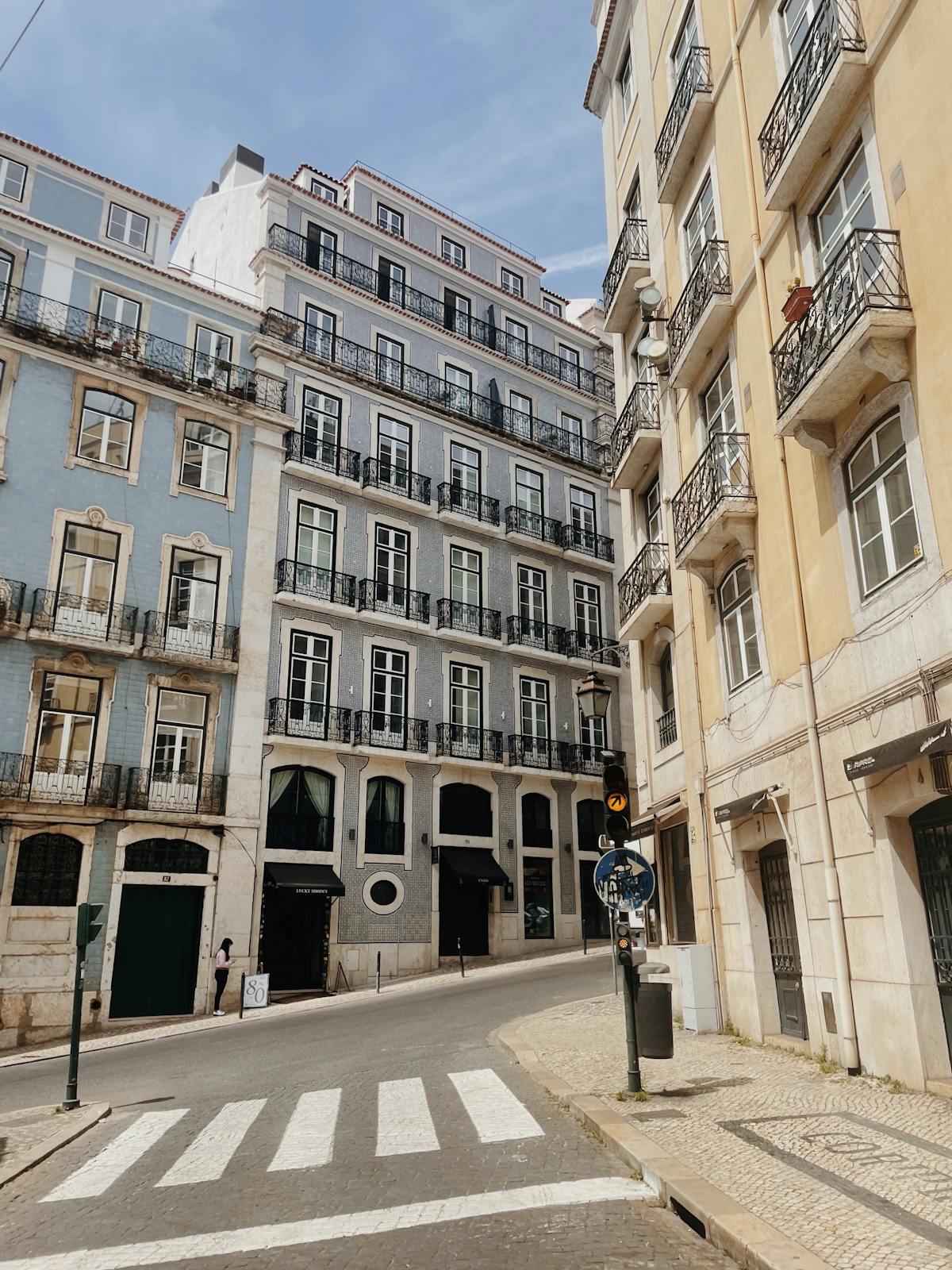 Colorful historic buildings on a street in Lisbon Portugal