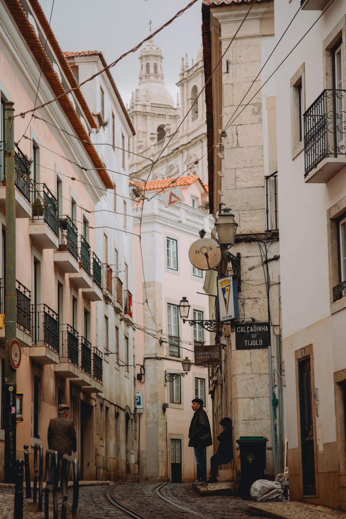 Panoramic view over Lisbon rooftops with the Tagus River in the background