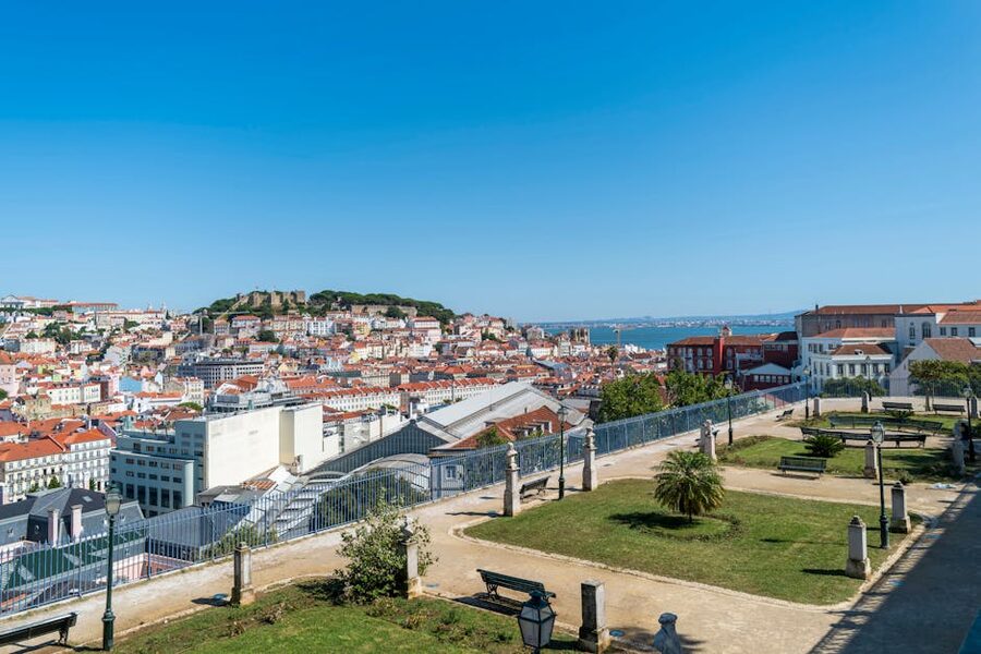 High view of Lisbon skyline with Sao Jorge Castle on horizon