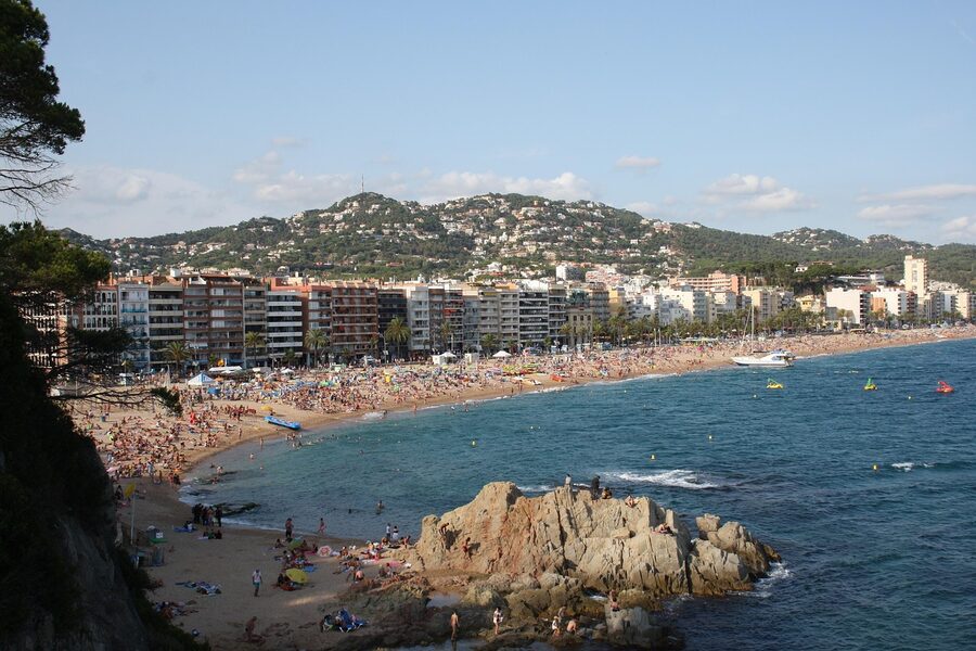 Mediterranean beach and coastline at Lloret de Mar with clear water