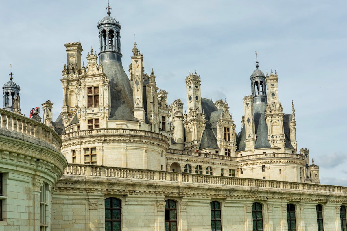 Close-up of the ornate rooftop towers and chimneys at Chateau de Chambord
