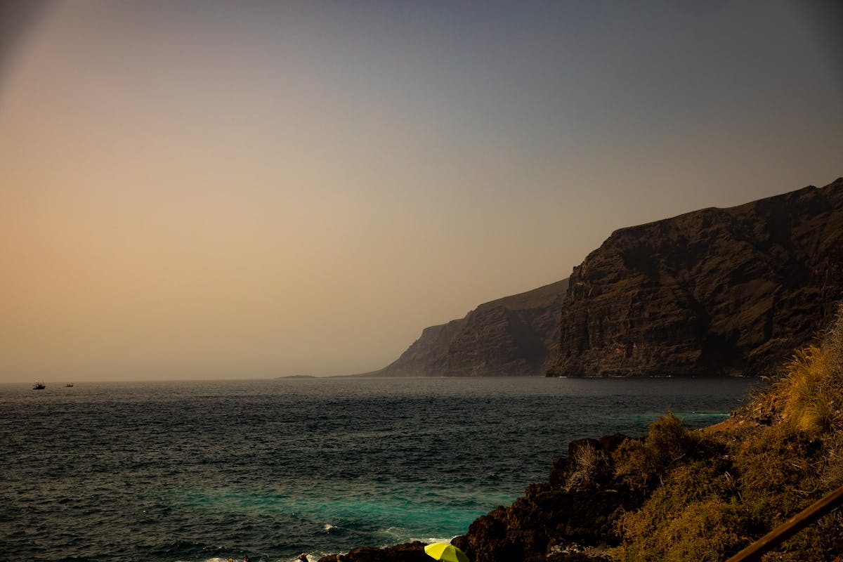 The dramatic Los Gigantes cliffs of Tenerife at sunset overlooking the Atlantic Ocean