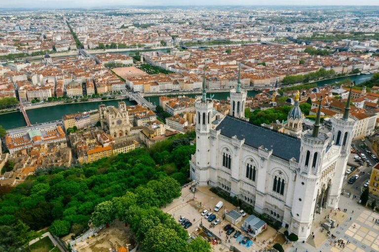 Aerial view of Lyon featuring the Basilica of Notre-Dame de Fourviere on the hilltop above the old town