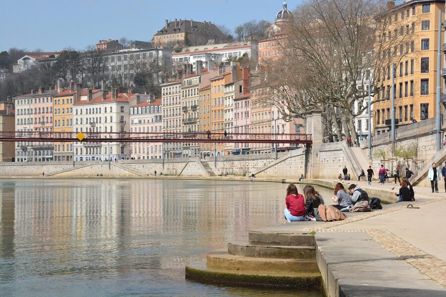 Colorful buildings and market at the Saone river docks in Lyon old city