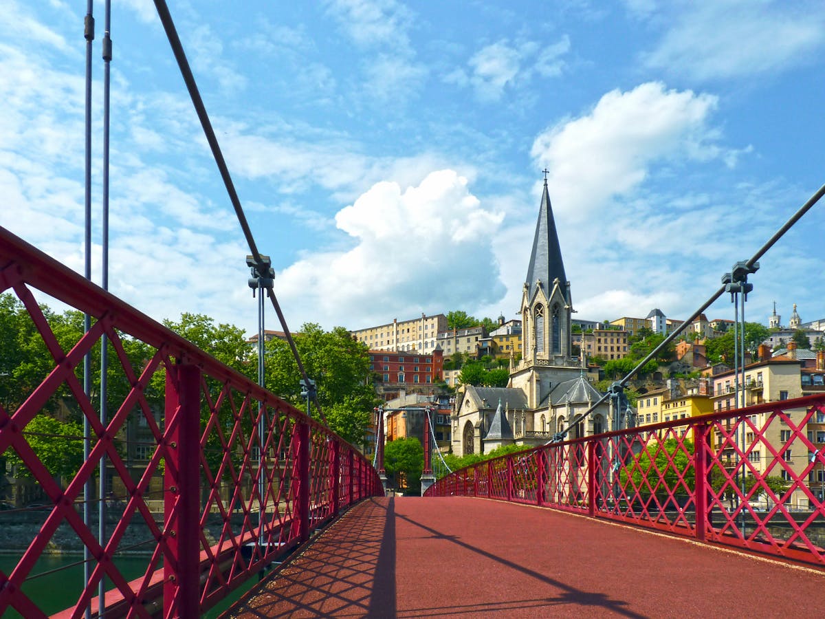 Saint George Church and footbridge over the Saone in Lyon France