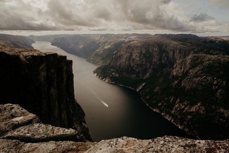 Boat in Lysefjord canyon