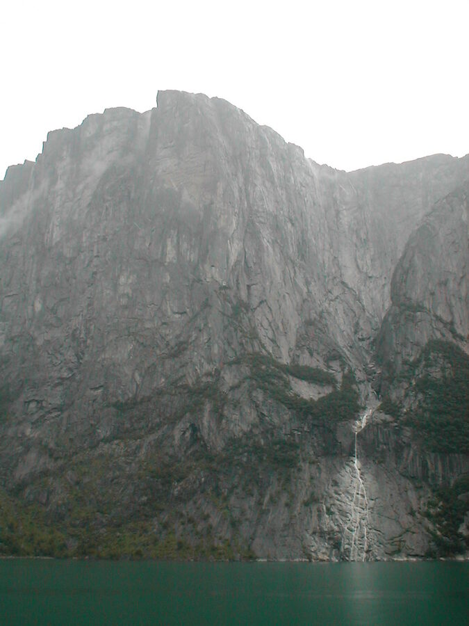 Tall mountains and waterfall in Lysefjord
