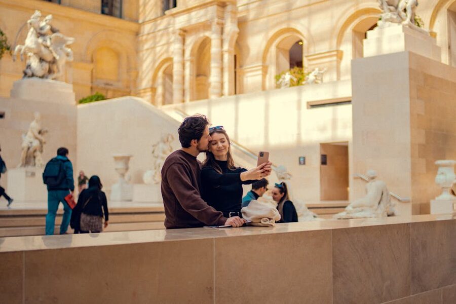 Couple taking a selfie at a museum