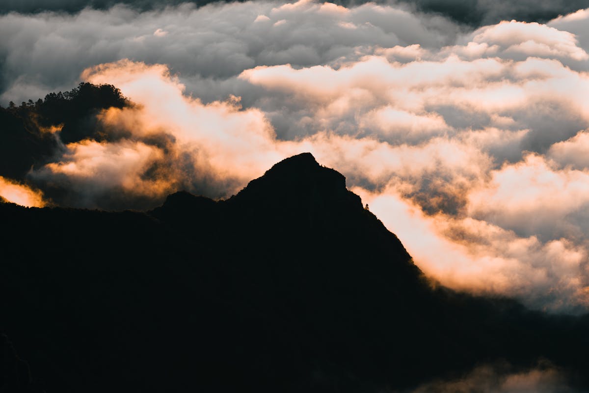 Breathtaking sunset over mountain peaks in Madeira