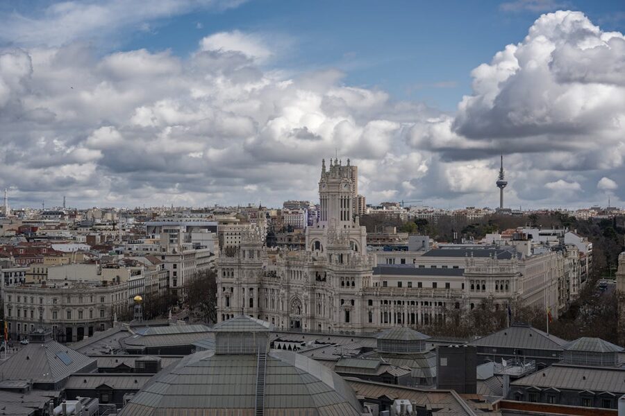 Aerial view of Cibeles Palace Madrid under cloudy sky