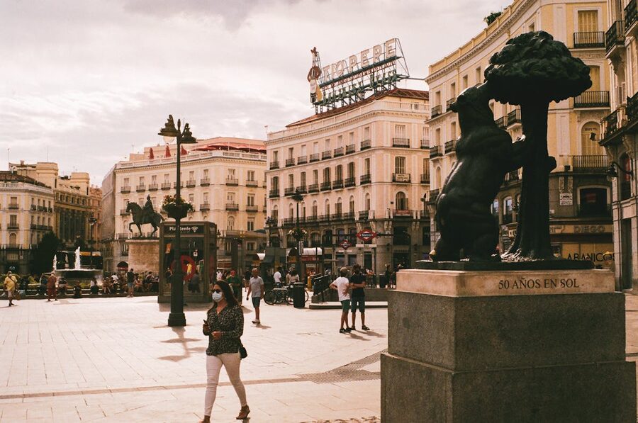 Bear and Strawberry Tree sculpture at Puerta del Sol in Madrid on a sunny day