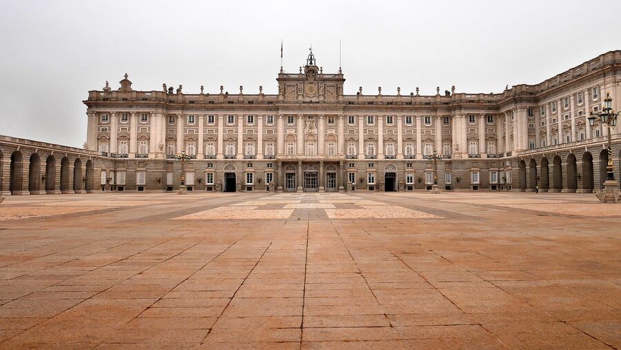 Tourists visiting the Royal Palace of Madrid