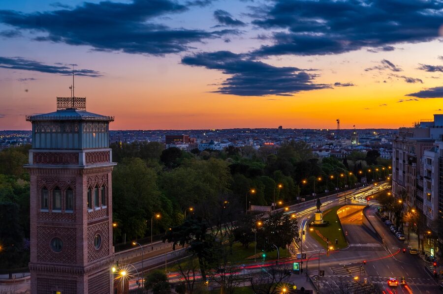 Madrid city skyline with monuments visible at sunset