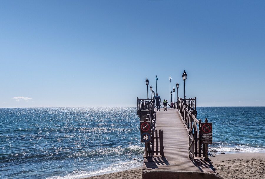 Wooden jetty pier extending into the Mediterranean Sea at Marbella