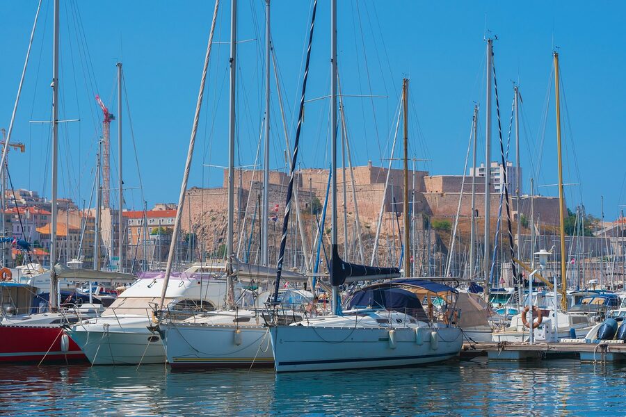 View of Marseille Old Port with historic Fort Saint-Jean and sailing boats
