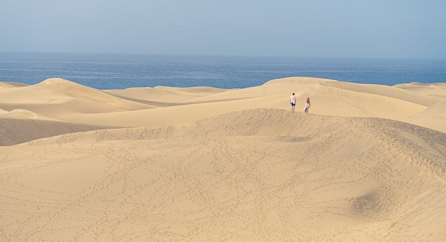 Sand dunes of Maspalomas stretching towards the Atlantic Ocean in Gran Canaria