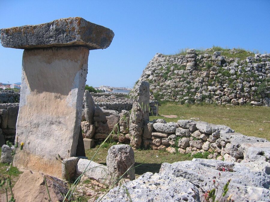 Prehistoric taula stone monument at an ancient Talayotic settlement in Menorca