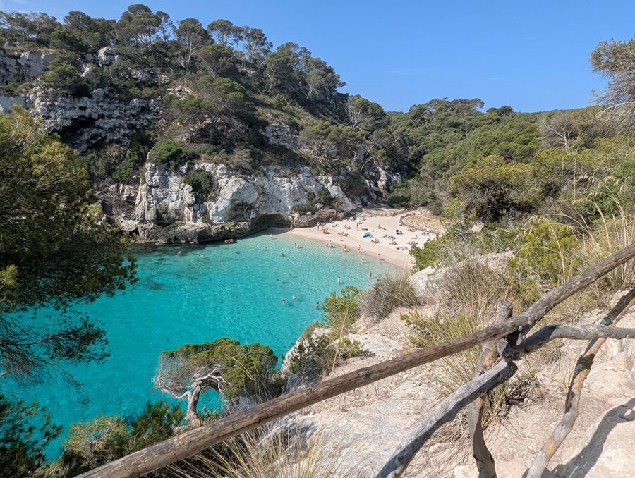 White sand beach at Cala Macarella with turquoise water in Menorca