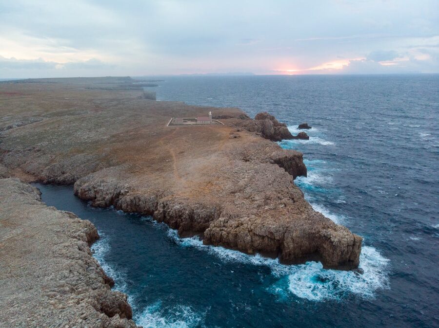 Dramatic coastline of Ciutadella de Menorca at sunset