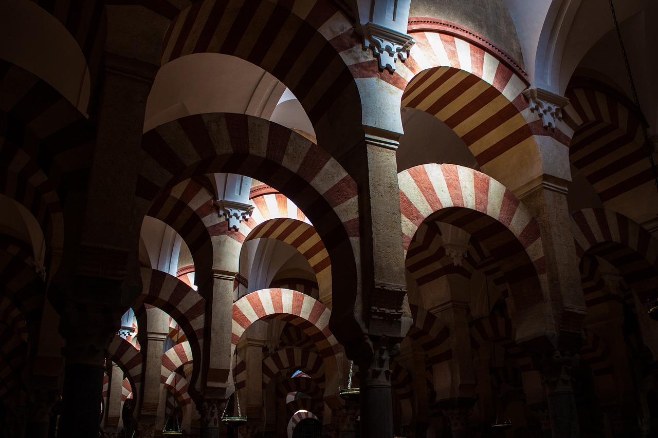 Close-up of the double-tiered horseshoe arches and marble columns inside the Mezquita