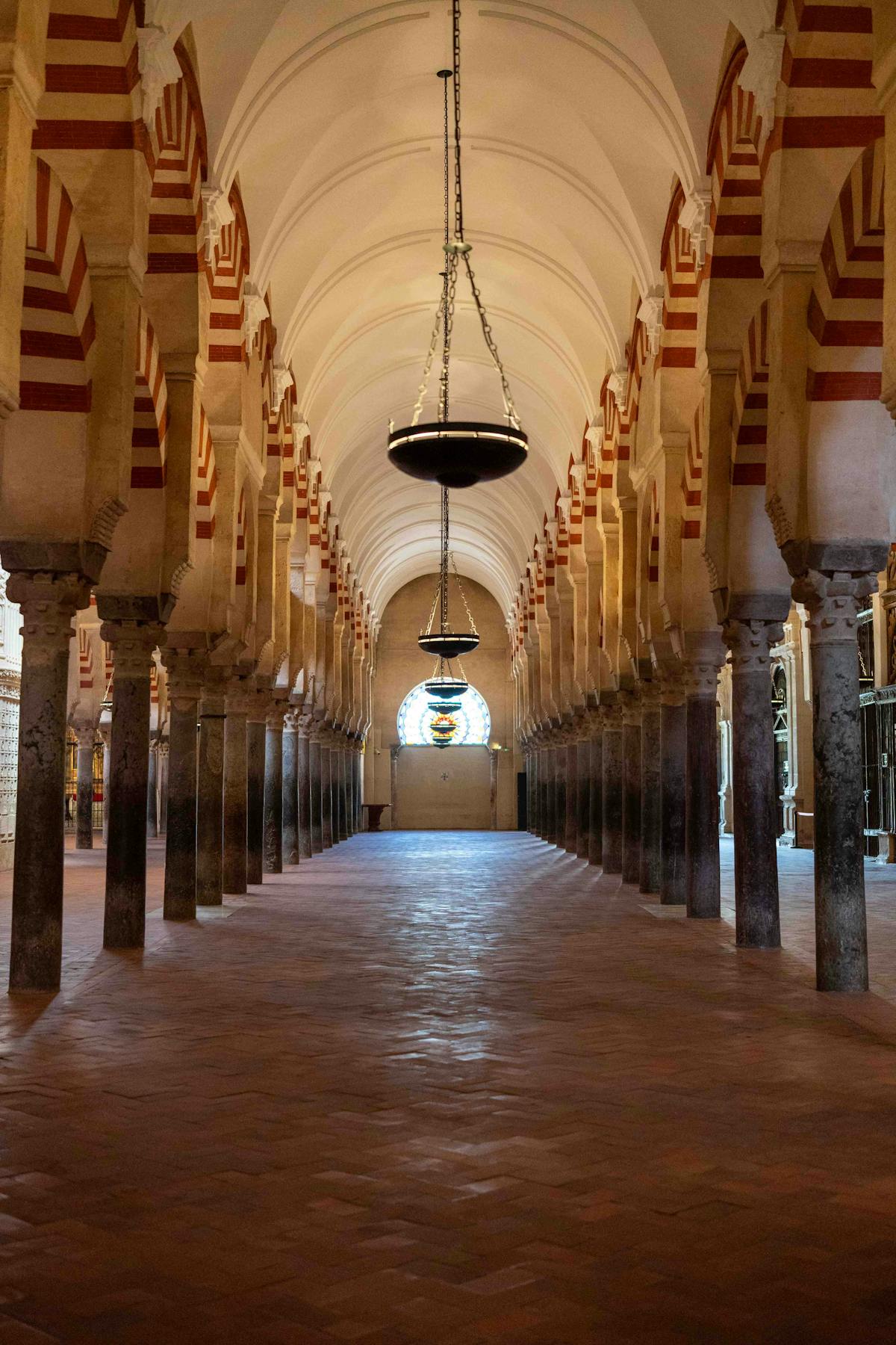 Beautiful wide view of the Mosque-Cathedral of Cordoba showing rows of iconic arches
