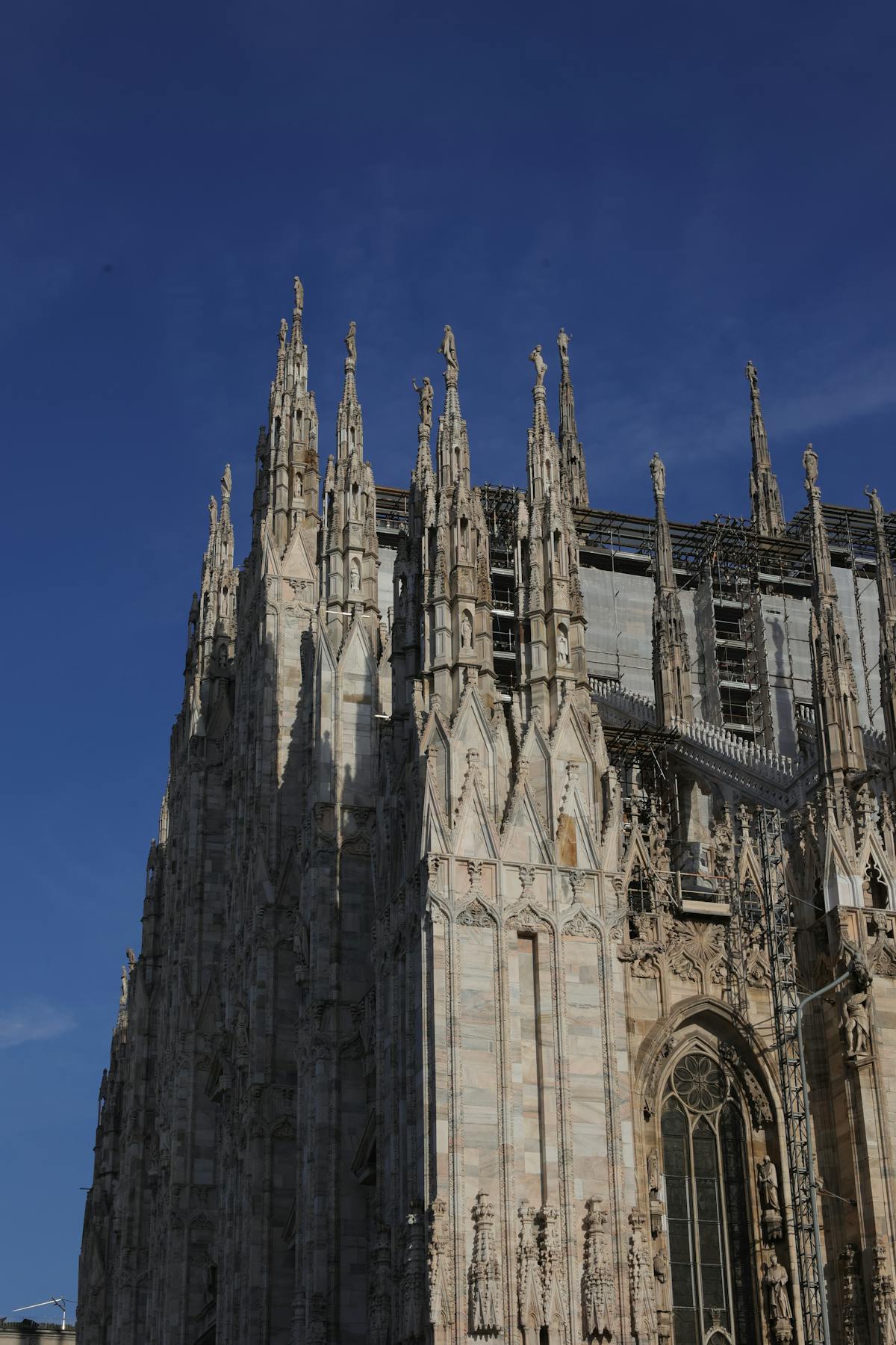Milan buildings and streets illuminated at night