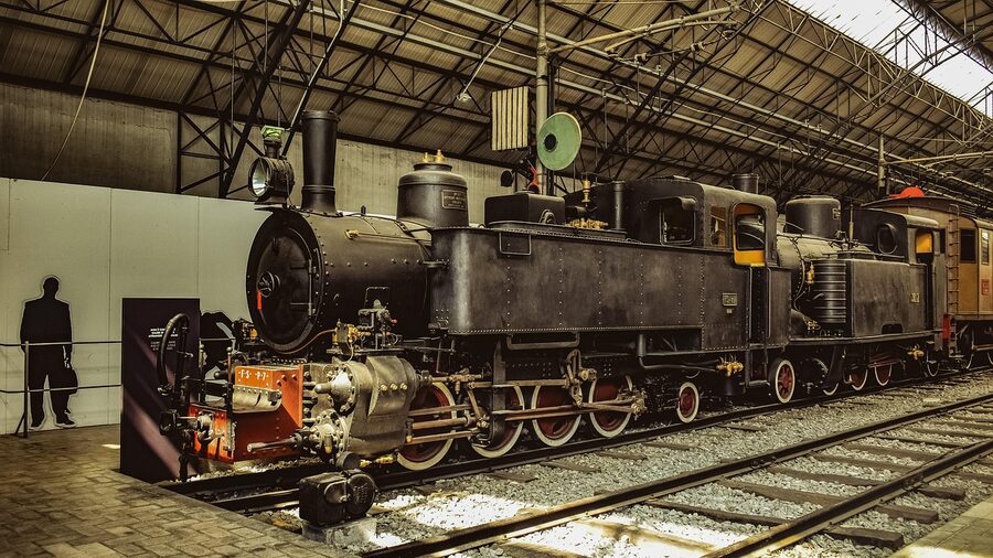 Vintage steam locomotive displayed at the Milan Museum of Science and Technology