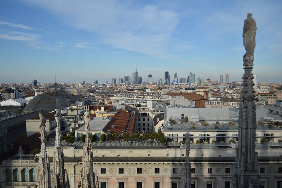 Panoramic aerial view of Milan skyline from the Duomo rooftop