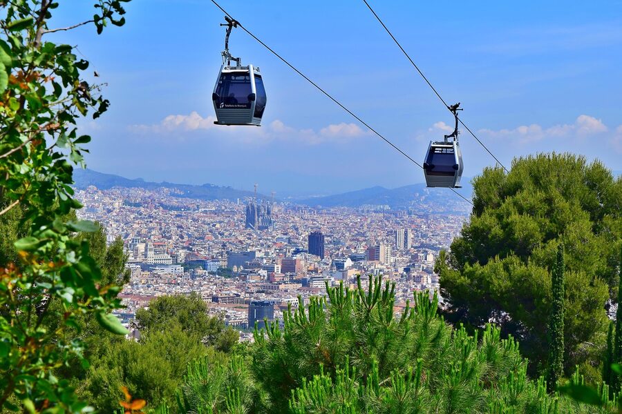 Cable car in Barcelona with Sagrada Familia in the background