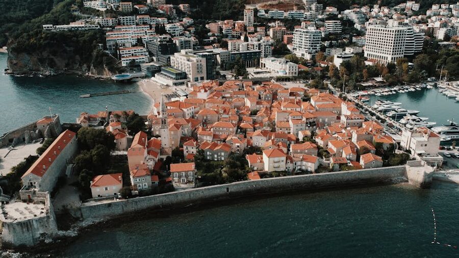 Budva Old Town red-tiled roofs aerial