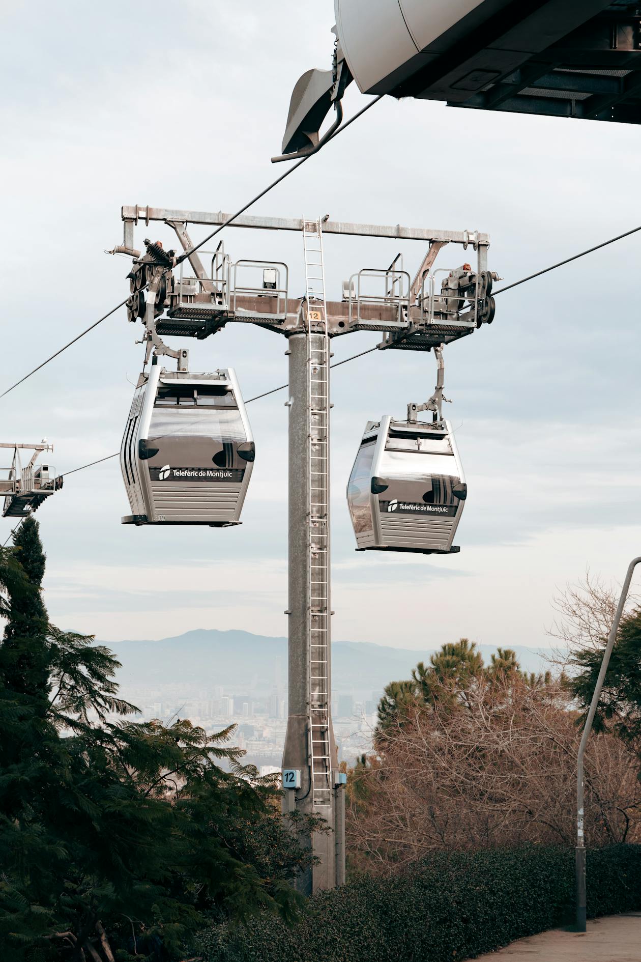 Montjuic cable car cabin with panoramic views of Barcelona below