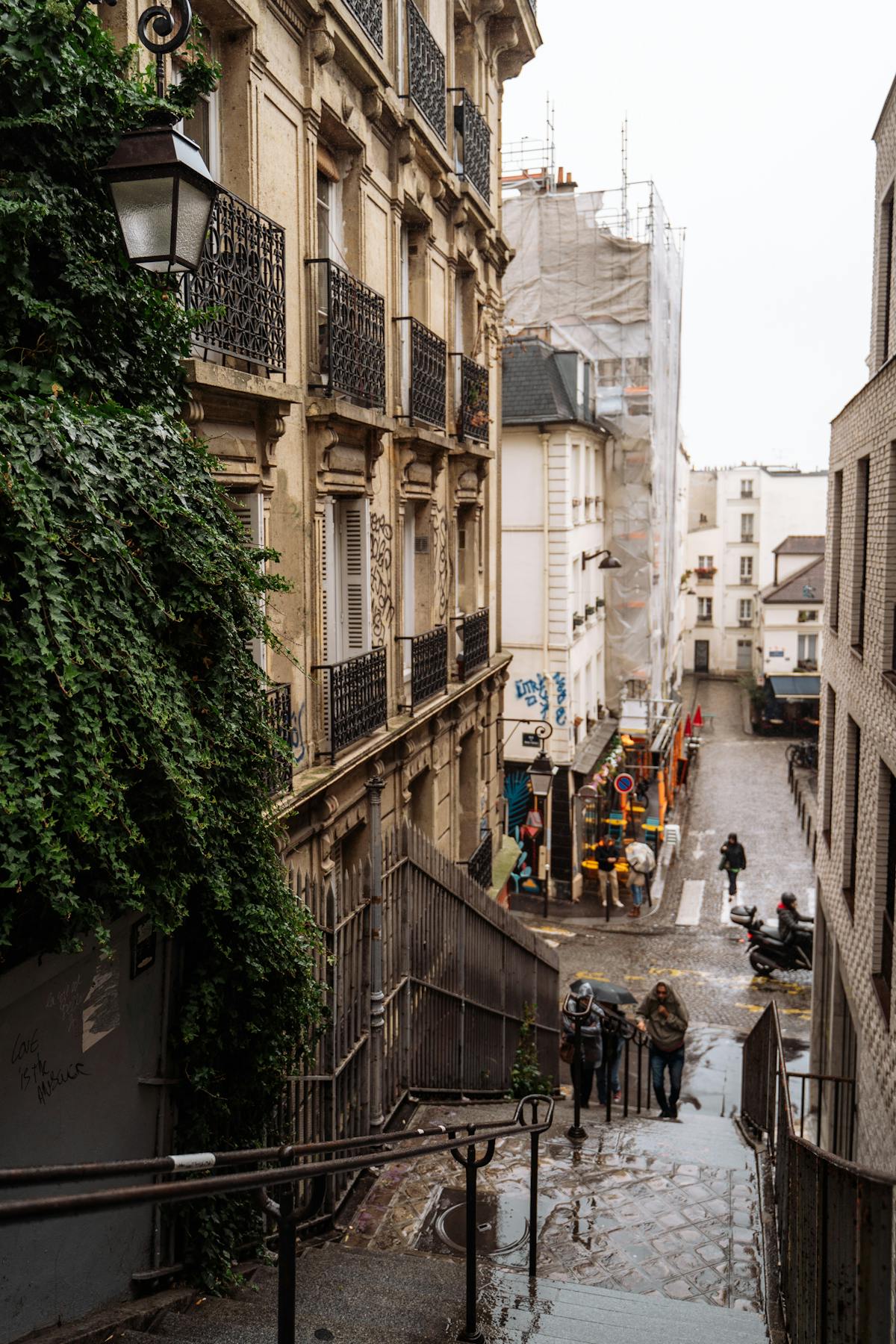 The romantic streets of Montmartre on a rainy day with historic architecture