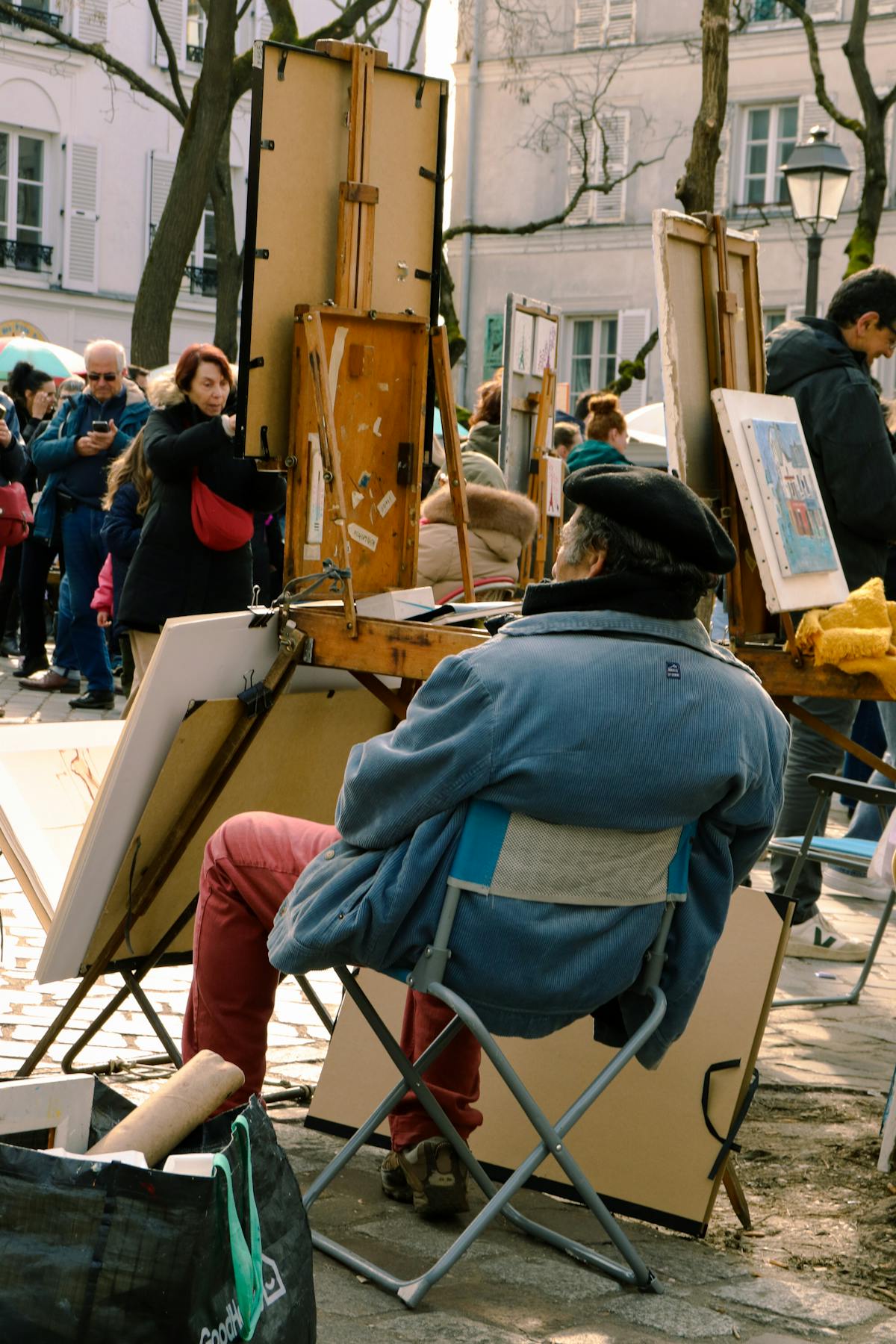 A street artist at work in Montmartre, Paris