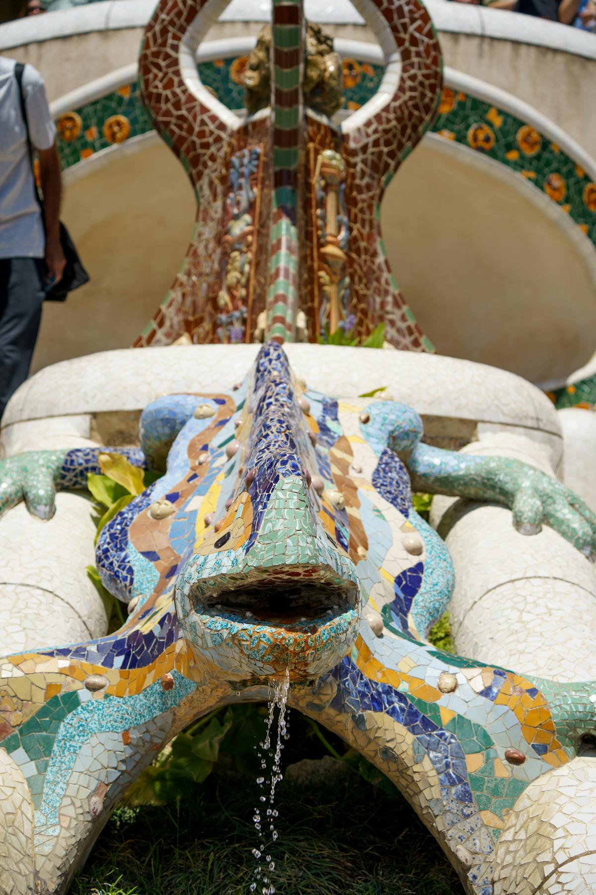 Vibrant mosaic lizard sculpture at Park Guell Barcelona