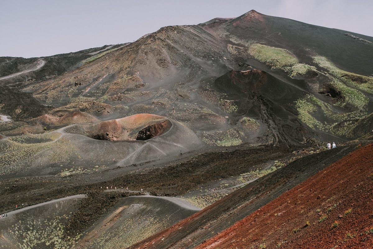 Rugged volcanic landscape on Mount Etna showing layers of old lava flows