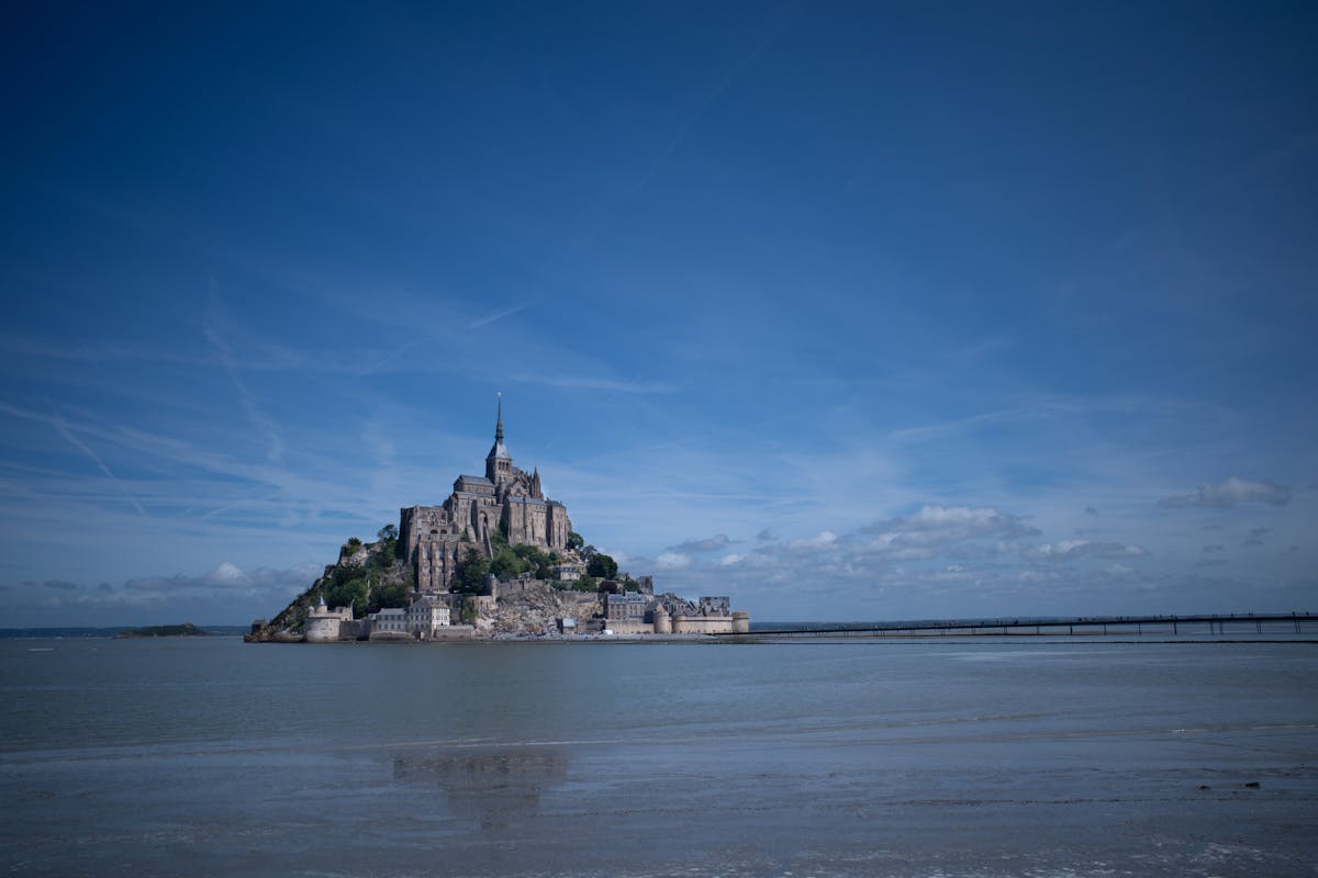 Mont Saint-Michel surrounded by green Normandy pastures