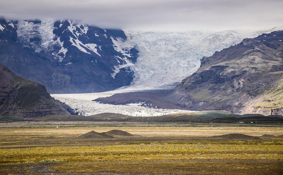 Mýrdalsjökull glacier descending from clouds Iceland