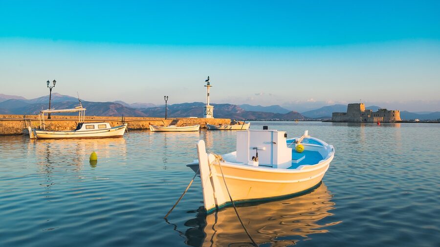 Nafplio boat at golden hour Peloponnese