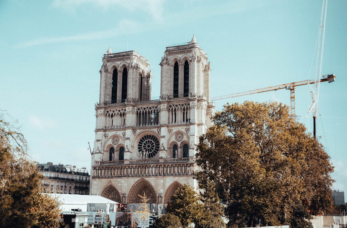 Notre-Dame Cathedral in Paris during restoration showing scaffolding and construction work
