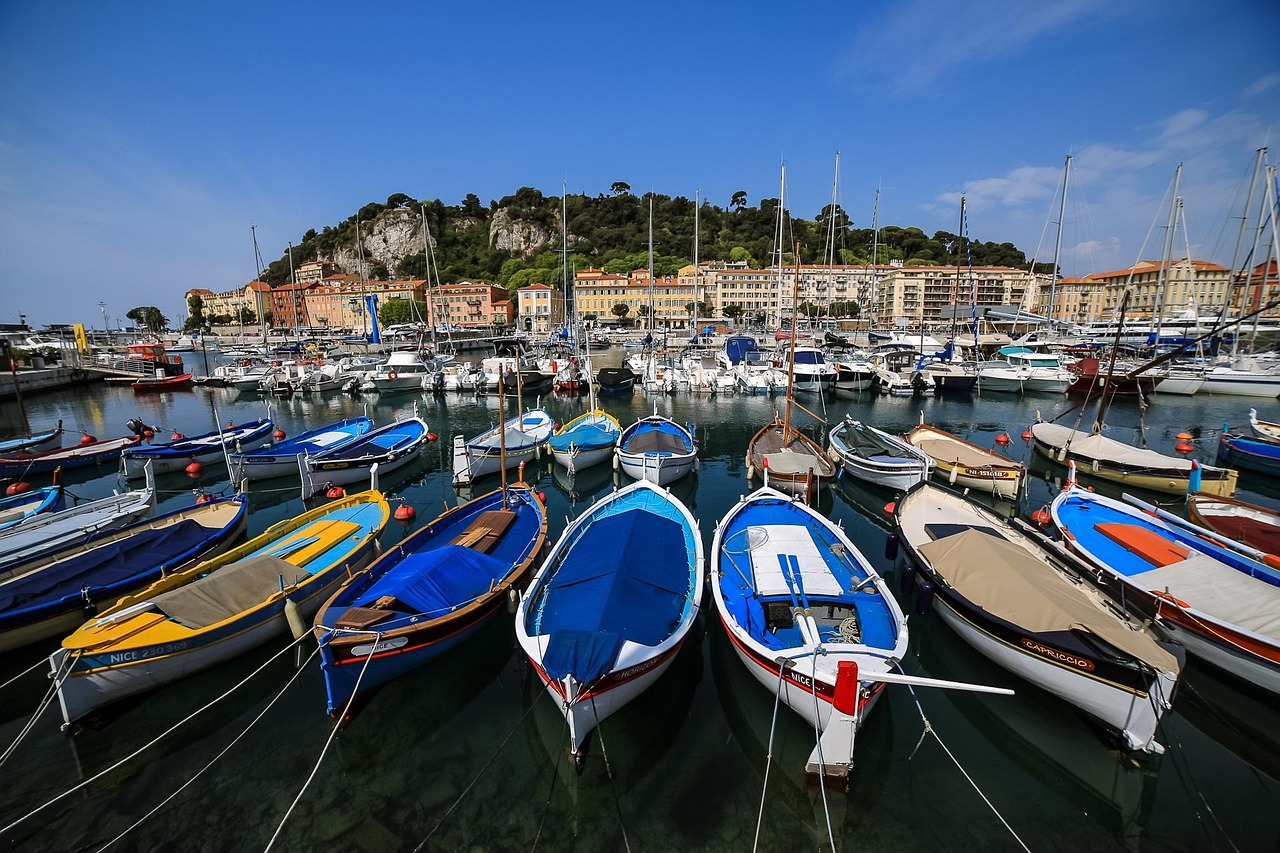 Port of Nice with colorful buildings and boats in the harbor