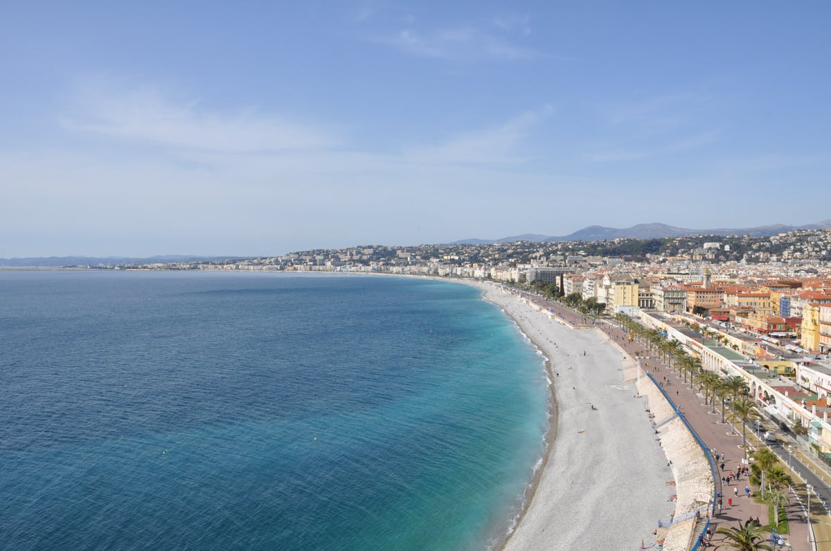 Aerial view of Nice coastline showing the Promenade des Anglais and blue Mediterranean