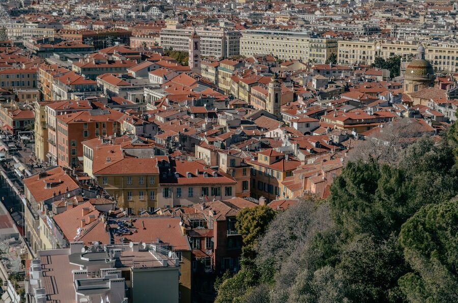 Aerial view of traditional red rooftops and architecture in Nice old town