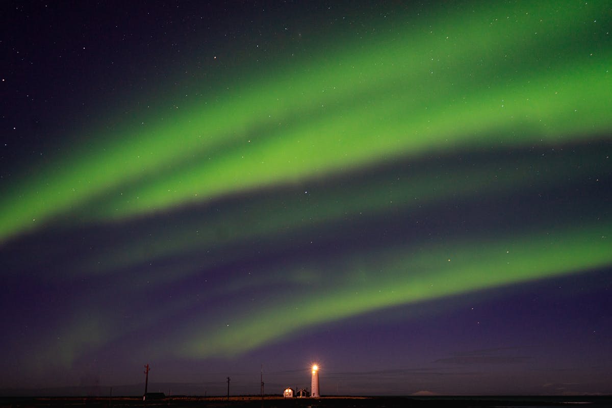 Aurora borealis over Grotta lighthouse in Iceland