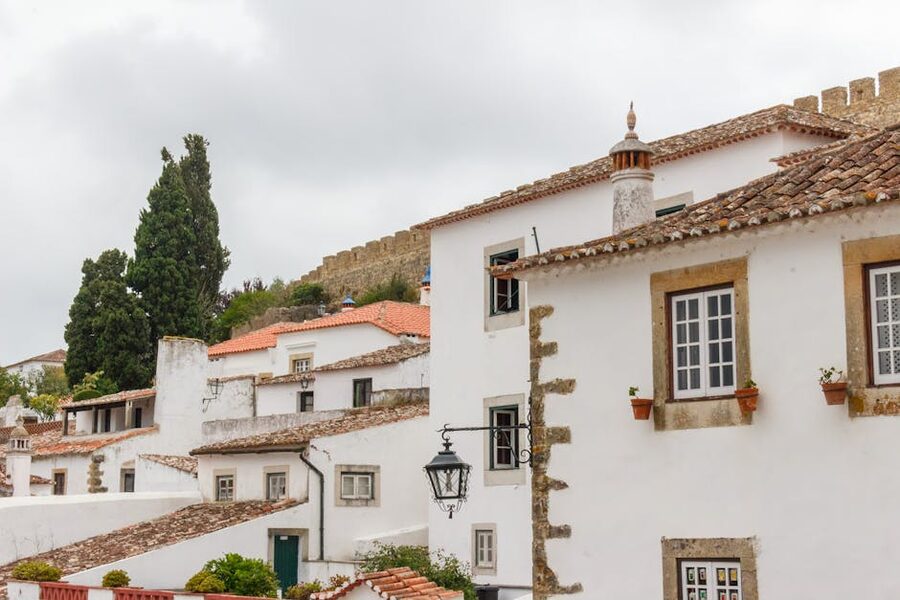 Obidos whitewashed houses and medieval walls Portugal