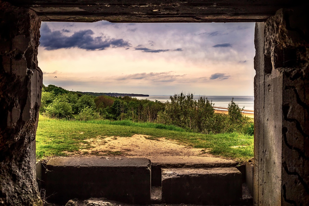 A German bunker with a view over Omaha Beach and the Normandy coastline